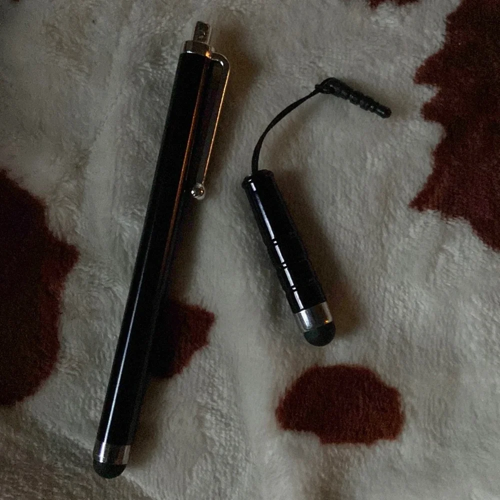 Phone stylists, on has a clip and one has an aux plug in to attach to phone
